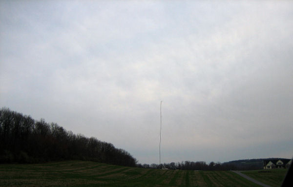  A fully erect 50-meter anemometer in the middle of a corn field