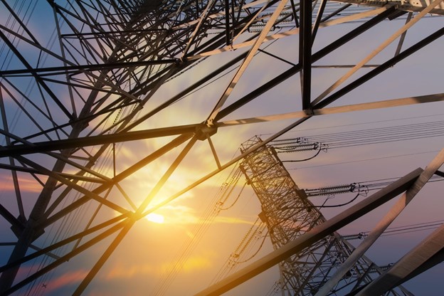 power lines and sky with sun